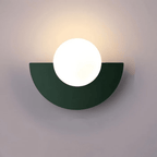 Glass Globe LED Wall Sconce With Iron Base For Modern Minimalist Rooms