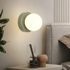Nordic Glass Globe LED Wall Sconce With Sleek Metal Base