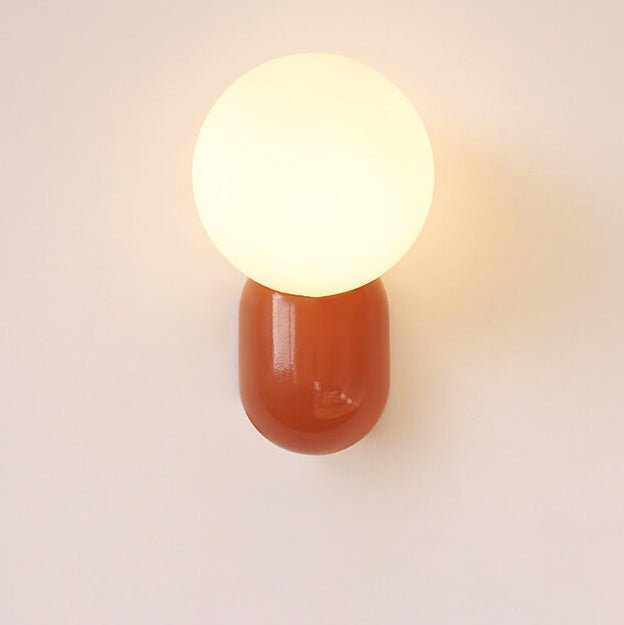 Glass Globe Wall Lamp With Resin Base For Elegant Home Interiors