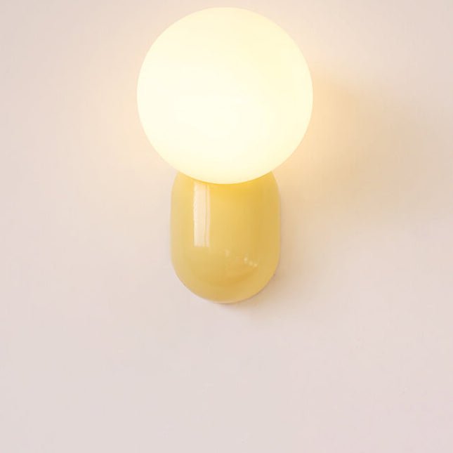 Glass Globe Wall Lamp With Resin Base For Elegant Home Interiors