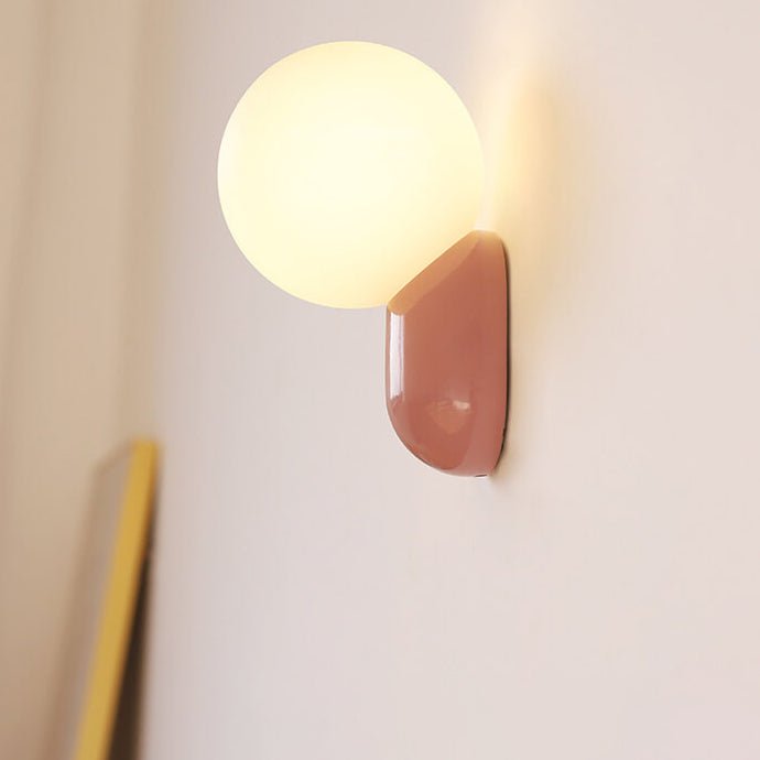 Glass Globe Wall Lamp With Resin Base For Elegant Home Interiors