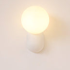 Glass Globe Wall Lamp With Resin Base For Elegant Home Interiors