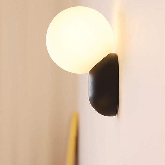 Glass Globe Wall Lamp With Resin Base For Elegant Home Interiors
