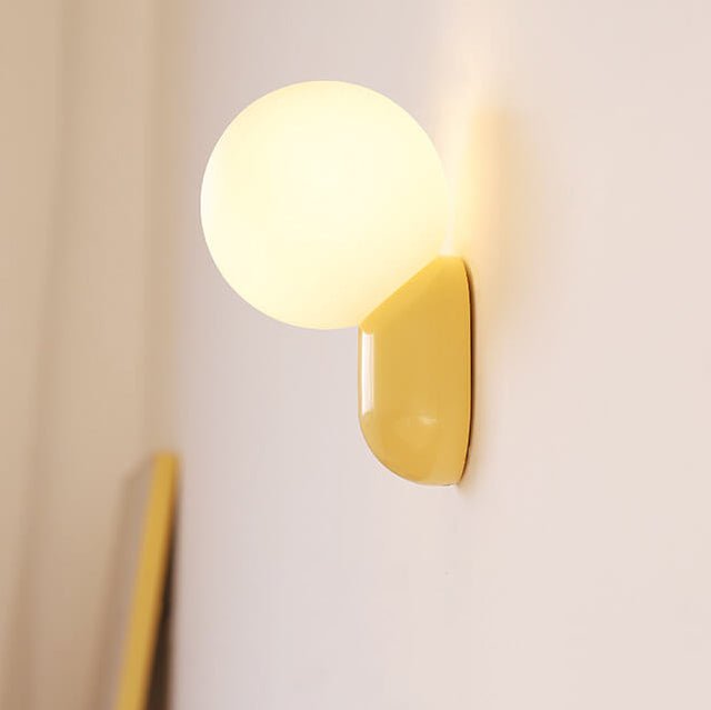 Glass Globe Wall Lamp With Resin Base For Elegant Home Interiors