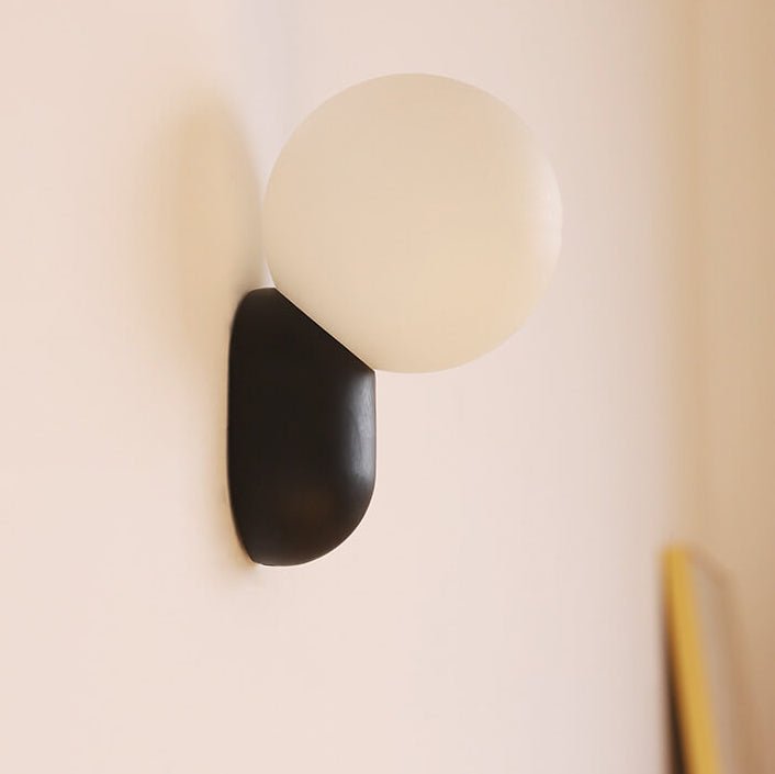 Glass Globe Wall Lamp With Resin Base For Elegant Home Interiors