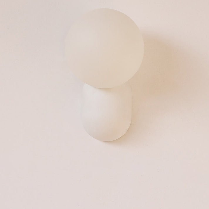 Glass Globe Wall Lamp With Resin Base For Elegant Home Interiors