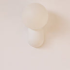 Glass Globe Wall Lamp With Resin Base For Elegant Home Interiors