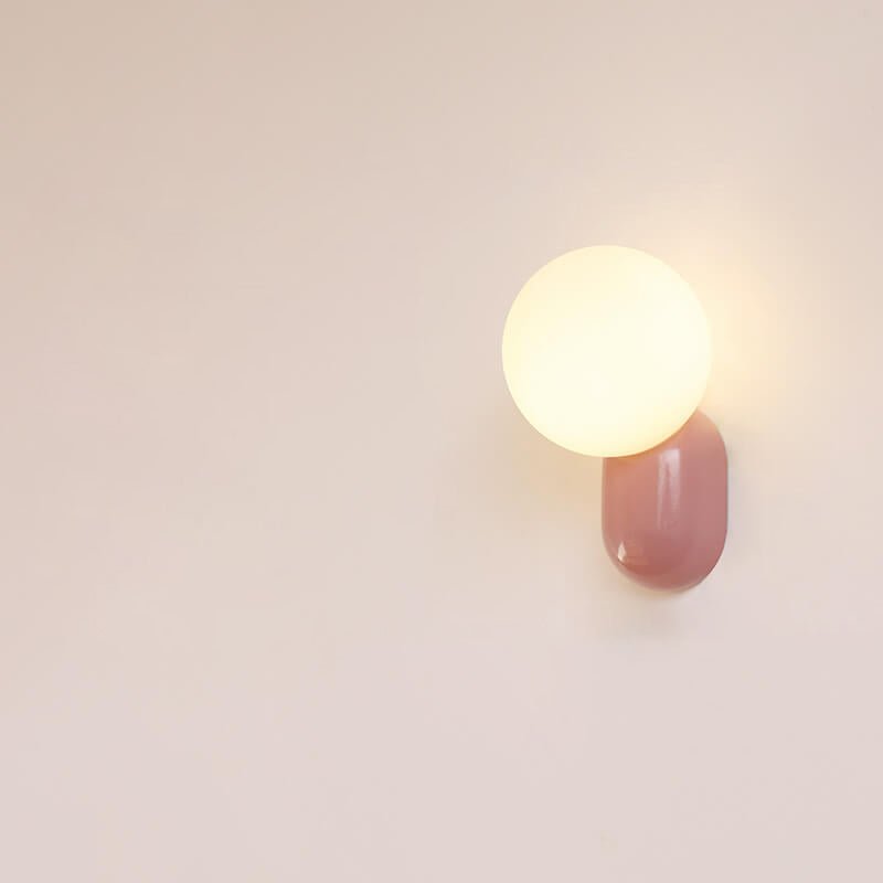 Glass Globe Wall Lamp With Resin Base For Elegant Home Interiors