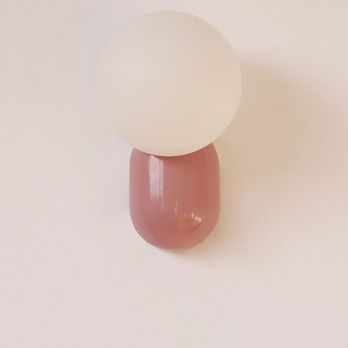Glass Globe Wall Lamp With Resin Base For Elegant Home Interiors