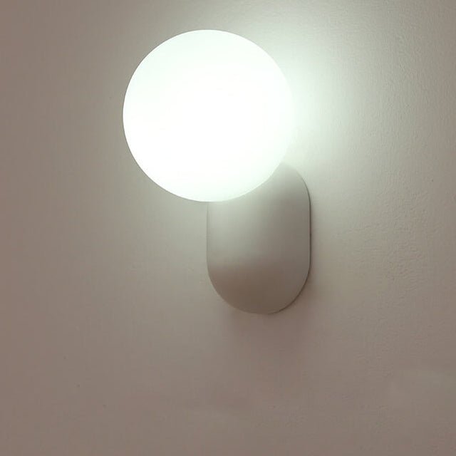 Glass Globe Wall Lamp With Resin Base For Elegant Home Interiors