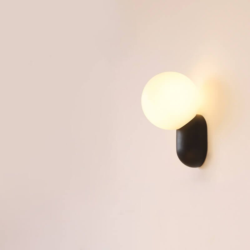 Glass Globe Wall Lamp With Resin Base For Elegant Home Interiors