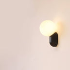 Glass Globe Wall Lamp With Resin Base For Elegant Home Interiors