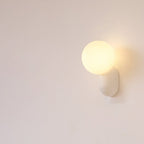 Glass Globe Wall Lamp With Resin Base For Elegant Home Interiors