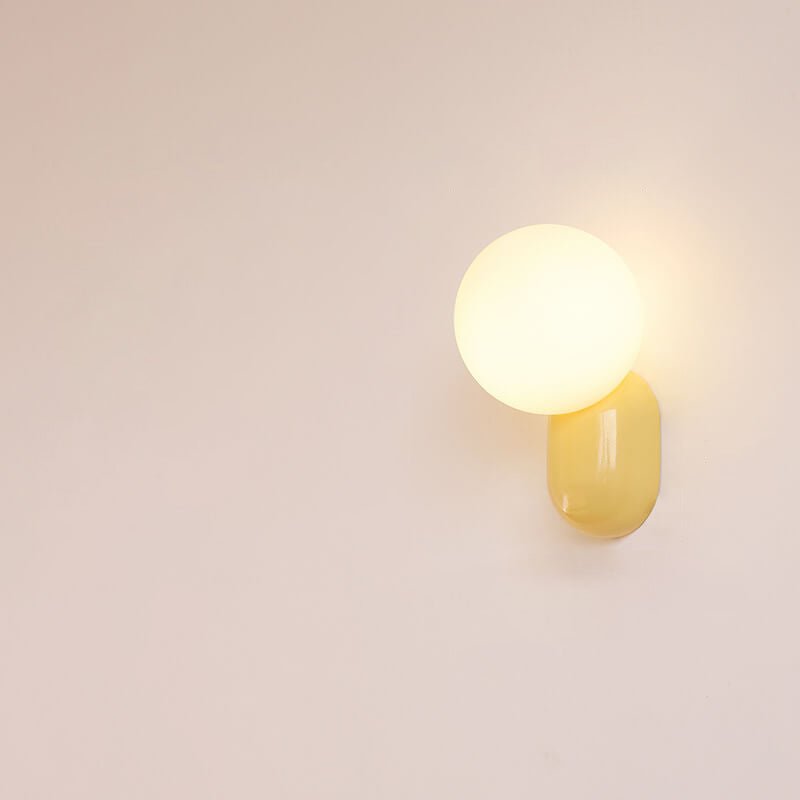 Glass Globe Wall Lamp With Resin Base For Elegant Home Interiors