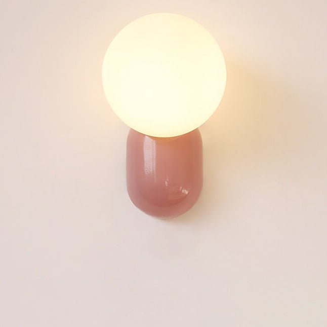 Glass Globe Wall Lamp With Resin Base For Elegant Home Interiors
